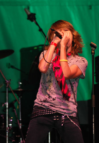 cramjam-12 Twelve-year-old Mishel Salum of Childsplay assures the crowd that the future of rock’n’roll most definitely isn’t at stake. (Cori Alfreds photo)