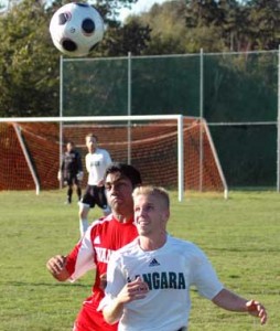 Kwantlen midfielder Ryan Sidhu, who scored the tying goal in the Eagles' comeback victory, battles a Langara player for the ball during the second half of their game on Saturday. (Dave Pires photo)