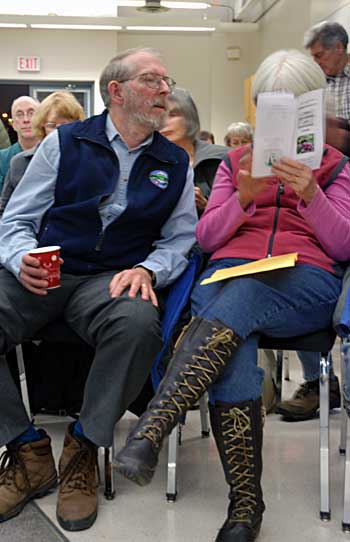 greencoupld Tom McMath, left, looks as wife, Sharon, points out something in the Green Idea’s Network brochure. (Sandy Buemann photo)