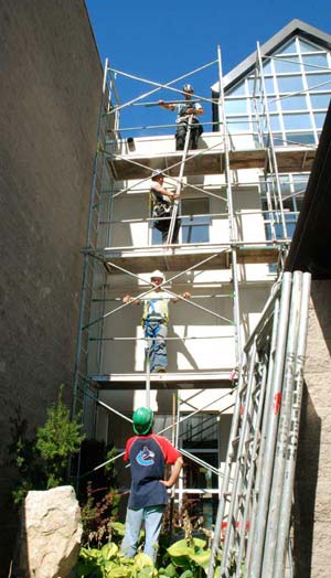 construction-workers Scaffolding has appeared outside Surrey's C Building as renovations get under way. (Abby Wiseman photo)