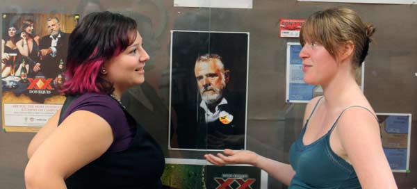 interesting600 KSA members Vanessa Knight and Catherine Wilkinson discuss the Most Interesting Man in the World at the Surrey campus on Thursday. (Jacob Zinn photo)
