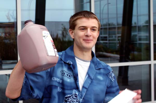 Milk-drinking competition. Kloeble, who placed second, won a four-litre jug of chocolate milk. All three received KSA water bottles. (Jacob Zinn photo)
