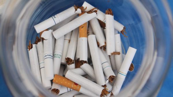 The cigarettes started adding up midway through the event. Cigarettes were broken in half to break bad habits and put in a jar at the Surrey campus. (Jacob Zinn photo)