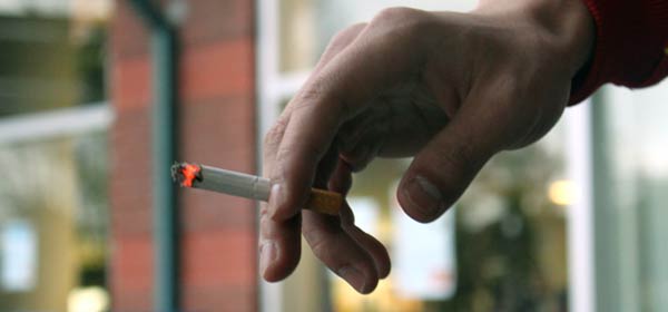 Taking a cigarette break at the Richmond campus. The KSA sells cigarette paper, but don't intend for it to be used solely for tobacco. (Jacob Zinn photo)