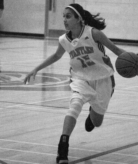 bb2 Taminder Dhaliwal drives up court against Vancouver Island University Friday. (Katie Lawrence photo)