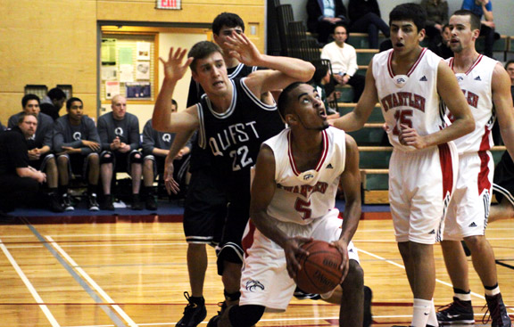 feb5-mens-first-quarter Eagles forward Ali Bosir looks for a way to the net halfway into the first quarter. (Justin Langille photo)