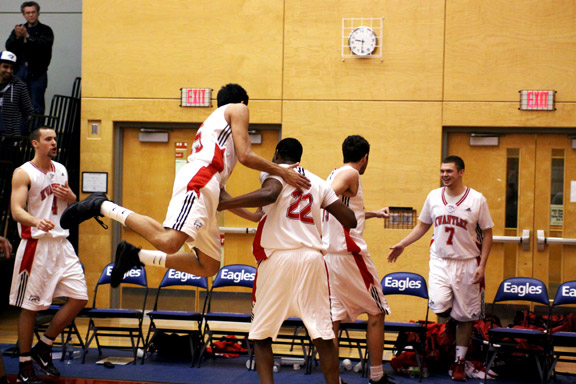 feb5-mens-win Varinder Singh gets airborne as he celebrates the Eagles win. (Justin Langille photo)