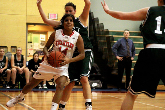 feb5-womens-block Eagles forward Shmyla Thandi takes it to the net in the second quarter, helping to secure an Eagles lead. (Justin Langille photo)