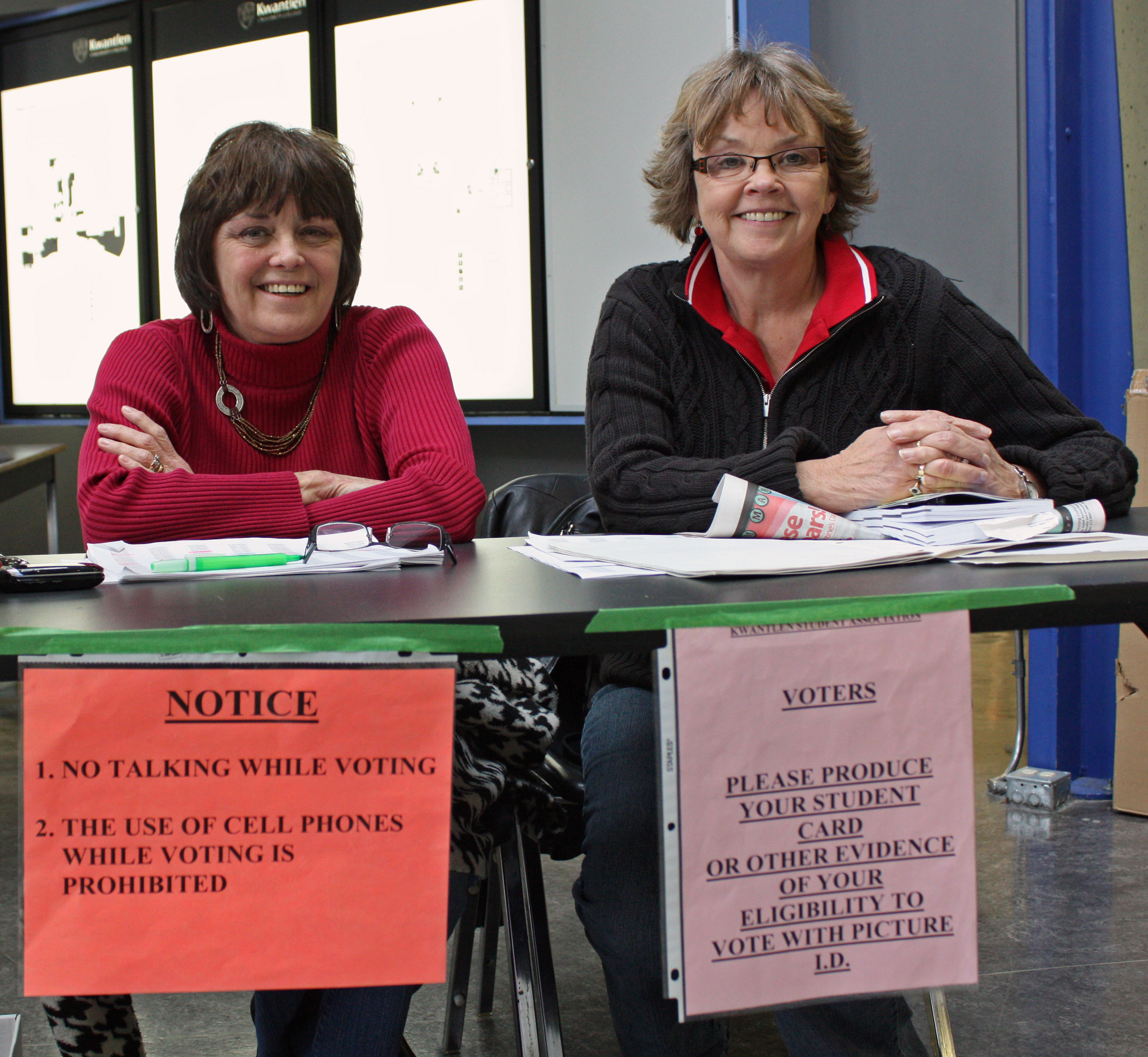 ladies Fran Schiffner and Alice Rush are on hand to make sure every vote is cast fairly. (Kyle Vinoly photo)