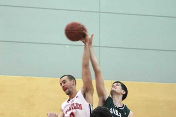 Kevin Kokoska wins the tip-off, getting the basketball away from Karol Cybula. Kevin Kokoska wins the tip-off, getting the basketball away from Karol Cybula.