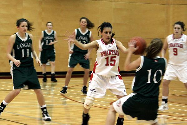 Taminder Dhaliwal tries to block Paige Burnham from passing to her teammates. Taminder Dhaliwal tries to block Paige Burnham from passing to her teammates.