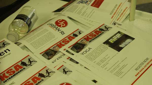 KSA-flyers for the intramurals on a table